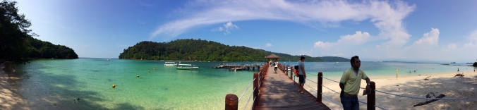 Panorama picture of the dock leading out from Sapi Island toward Gaya Island in Borneo, Malaysia